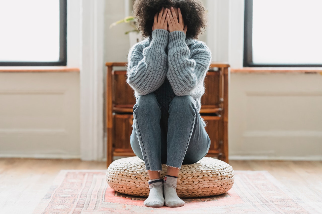 Crisis Counselling - Girl with Hands on her head